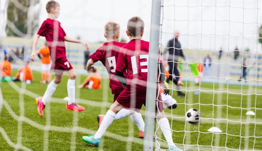 depositphotos_63612617-stock-photo-boys-playing-football-soccer-game